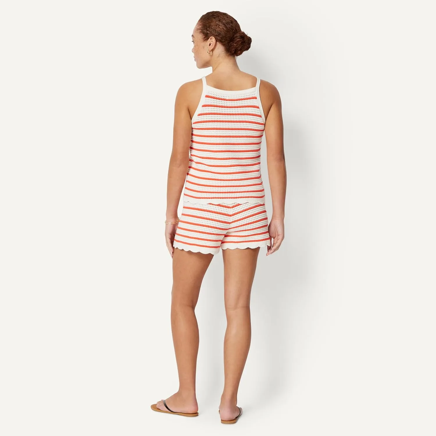 Back view of Amazon Essentials x Sofia Grainge crochet tank and shorts set showing striped knit pattern and scallop hem